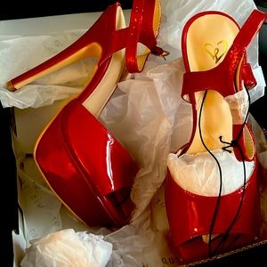 Brand new in box red high heels 6.5 size- shiny and very cute.